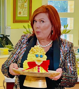 Bluey Duck cake held by Tenina